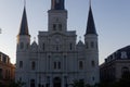 Majestic church with two symmetrical towers, each topped with a clock face