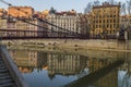Majestic cityscape of Lyon city by the river with building reflections on the water