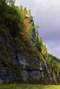 The majestic cliffs of Usva Pillars rise on the right bank of the Usva River in the Perm Territory