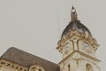 Majestic clock tower in a bustling urban cityscape