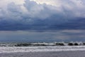 Majestic dramatic sunset sky with large and dark rain clouds in evening time over the Andaman Sea Royalty Free Stock Photo