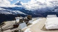 Majestic Dreamy View of snowy Gornergrat station and the iconic Matterhorn Peak shrouded with clouds, Zermatt, Switzerland, Europe Royalty Free Stock Photo