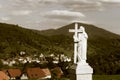 Majestic Jesus Christ sculpture over little french village Royalty Free Stock Photo