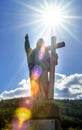 Majestic Jesus Christ sculpture over little french village Royalty Free Stock Photo