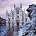 Majestic lion statue in front of Duomo di Milano church in Milan, Italy Royalty Free Stock Photo