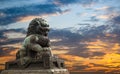 Majestic lion statue with sunset glow background Royalty Free Stock Photo