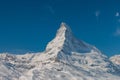 Majestic Matterhorn mountain in front of a blue sky