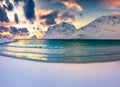 Majestic morning seascape of Norwegian seascape. Empty Vik Beach after huge snowfall.