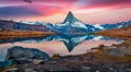 Majestic morning view of Stellisee lake with Matterhorn peak on background. Captivating autumn scene of Swiss Alps, Switzerland, E