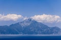 Majestic Mount Athos in the summer afternoon is all in blue shades, borrowed from the sea and the sky. Halkidiki, Greece