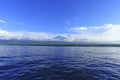 Majestic Mount Rinjani, Indonesia view from tourist boat. Royalty Free Stock Photo