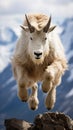 Majestic Mountain Goat Leaping Amidst Snow-Capped Peaks