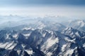 majestic mountain range, with peaks and valleys covered in snow, stretching as far as the eye can see Royalty Free Stock Photo