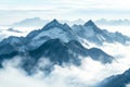 majestic mountain range rises above a sea of clouds, its peaks adorned with intricate patterns of snow and ice Royalty Free Stock Photo