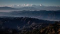 Majestic mountain range, tranquil dawn, panoramic view generated by AI