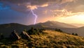 Majestic Mountain Sunset with Dramatic Lightning Storm Royalty Free Stock Photo