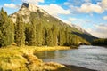 Bow river Banff Canada evergreens mountains Royalty Free Stock Photo