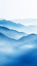 Majestic Mountains: A Serene Landscape of Fog, Sky, and Sapphire