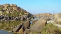 Majestic Mountains, Tranquil River, and Timeless Rocks