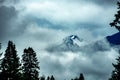 Majestic Mt. Ranier seen through the low-lying clouds Royalty Free Stock Photo
