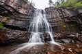 Majestic Multilevel Waterfall Amidst Rocky Terrain Royalty Free Stock Photo