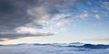 Majestic natural view of the mountains in the clouds Royalty Free Stock Photo