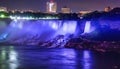 Majestic Niagara Falls at night, illuminated for a light show, view from canadian side Royalty Free Stock Photo