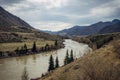 Majestic panorama of the Altai Mountains on spring or autumn day. Rocky mountains and the bend of Katun River under a cloudy sky Royalty Free Stock Photo