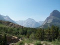 Majestic peaks rise above glacier carved valleys in Glacier National Park Royalty Free Stock Photo