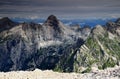 The majestic Razor peak, Julian Alps and layer of clouds