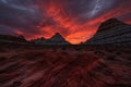majestic red rock formations in fiery sunset, surrounded by black sky Royalty Free Stock Photo