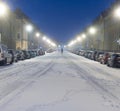 Great Pulteney Street at night in snow, with person walking in r Royalty Free Stock Photo