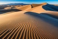 Majestic Sand Dunes and Desert Landscape with Blue Sky and Mountain Range Royalty Free Stock Photo