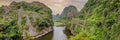 the majestic scenery on Ngo Dong river in Tam Coc Bich Dong view from drone in Ninh Binh province of Viet Nam BANNER Royalty Free Stock Photo