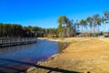 A majestic shot of the still blue lake waters of Lake McIntosh in Peachtree City, Georgia