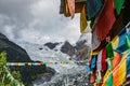 The majestic snow-capped mountains are covered by thick clouds