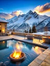 Majestic snow-covered mountains create a stunning backdrop to a luxury outdoor setting. Royalty Free Stock Photo
