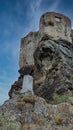 Majestic stone edifice on a picturesque mountain slope in Corsica, France