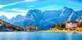 Majestic sunny view of famous Misurina lake during autumn period