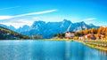 Majestic sunny view of famous Misurina lake during autumn period