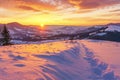 Sunrise in the winter hills mountains landscape.