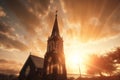 Majestic sunrise illuminating a church steeple