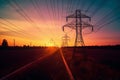 Majestic sunset meets renewable energy, Solar panels and electricity pylon Royalty Free Stock Photo