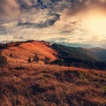 Majestic sunset. Mountain valley during sunrise. Natural evening summer landscape