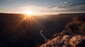 A majestic sunset over a canyon with dramatic shadows and highlights