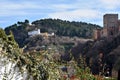 The majestic `Torre de Comares` of the Alhambra contemplated from a viewpoint in the Albaicin