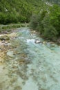 Majestic turquoise Soca river in the green forest, Bovec, Slovenia, Europe. Royalty Free Stock Photo