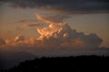 Majestic view of sky with big colorful clouds over mountain silhouette. Beauty in nature.