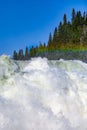 Scenic view of Tannforsen waterfall in Sweden on a sunny day Royalty Free Stock Photo