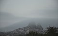 View to highest point on Cappadocia, Uchisar castle blotted out by the heavy morning autumn fog